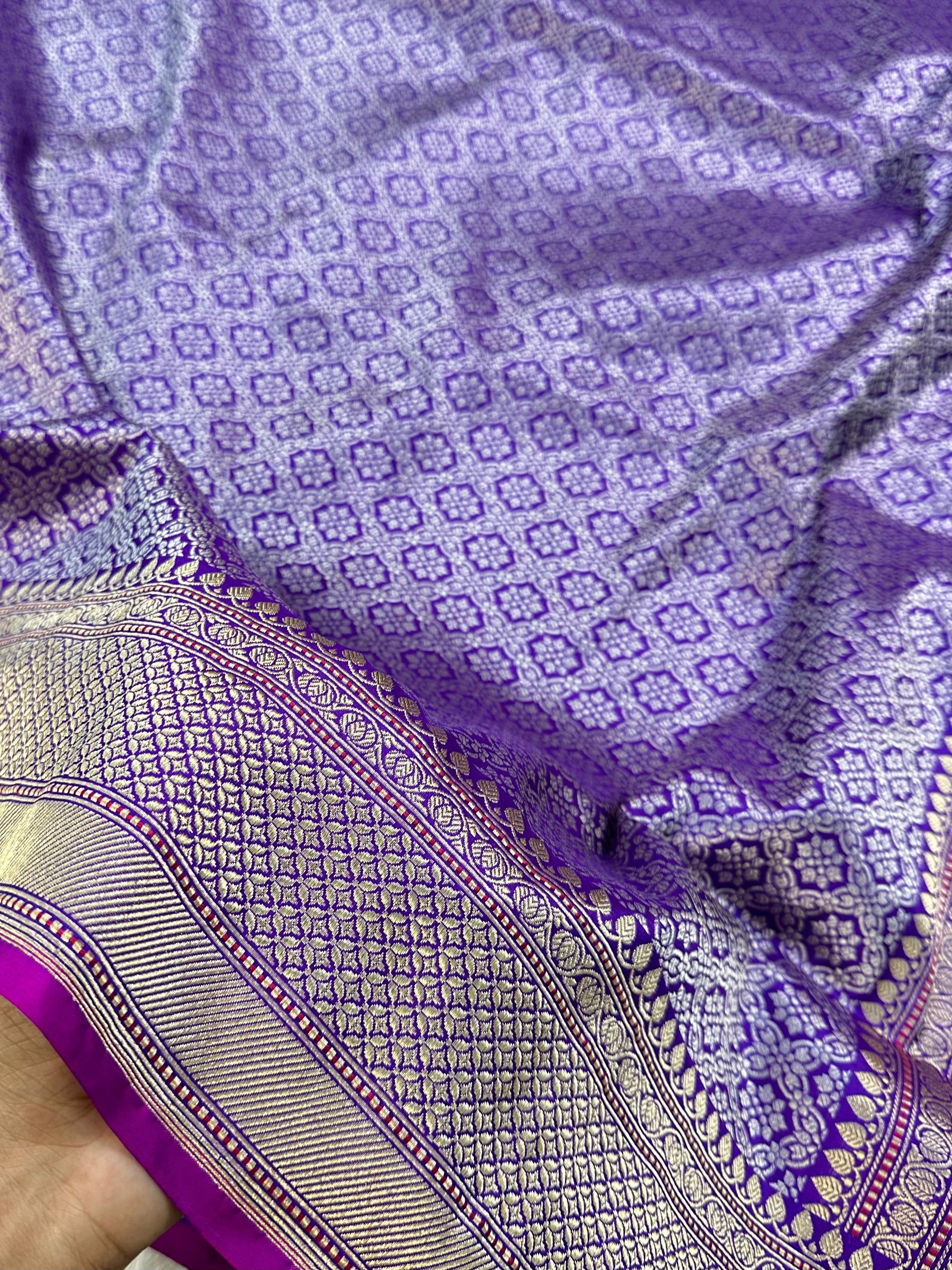 A Beautiful and Delicate Purple saree that appears to be a contemporary take on classic Kadua Banarasi weaving.