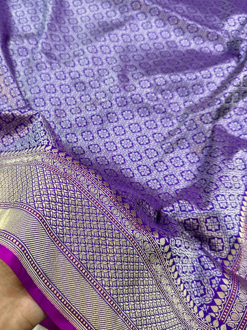 A Beautiful and Delicate Purple saree that appears to be a contemporary take on classic Kadua Banarasi weaving.