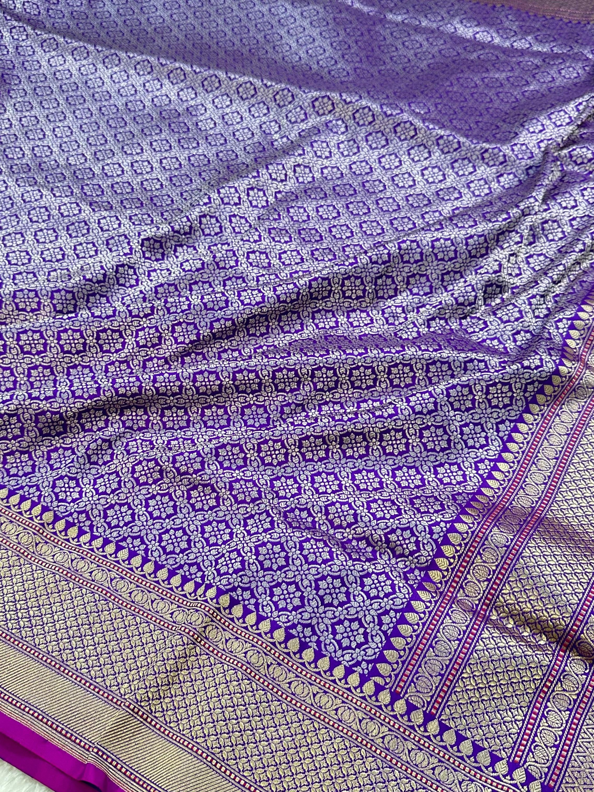 A Beautiful and Delicate Purple saree that appears to be a contemporary take on classic Kadua Banarasi weaving.