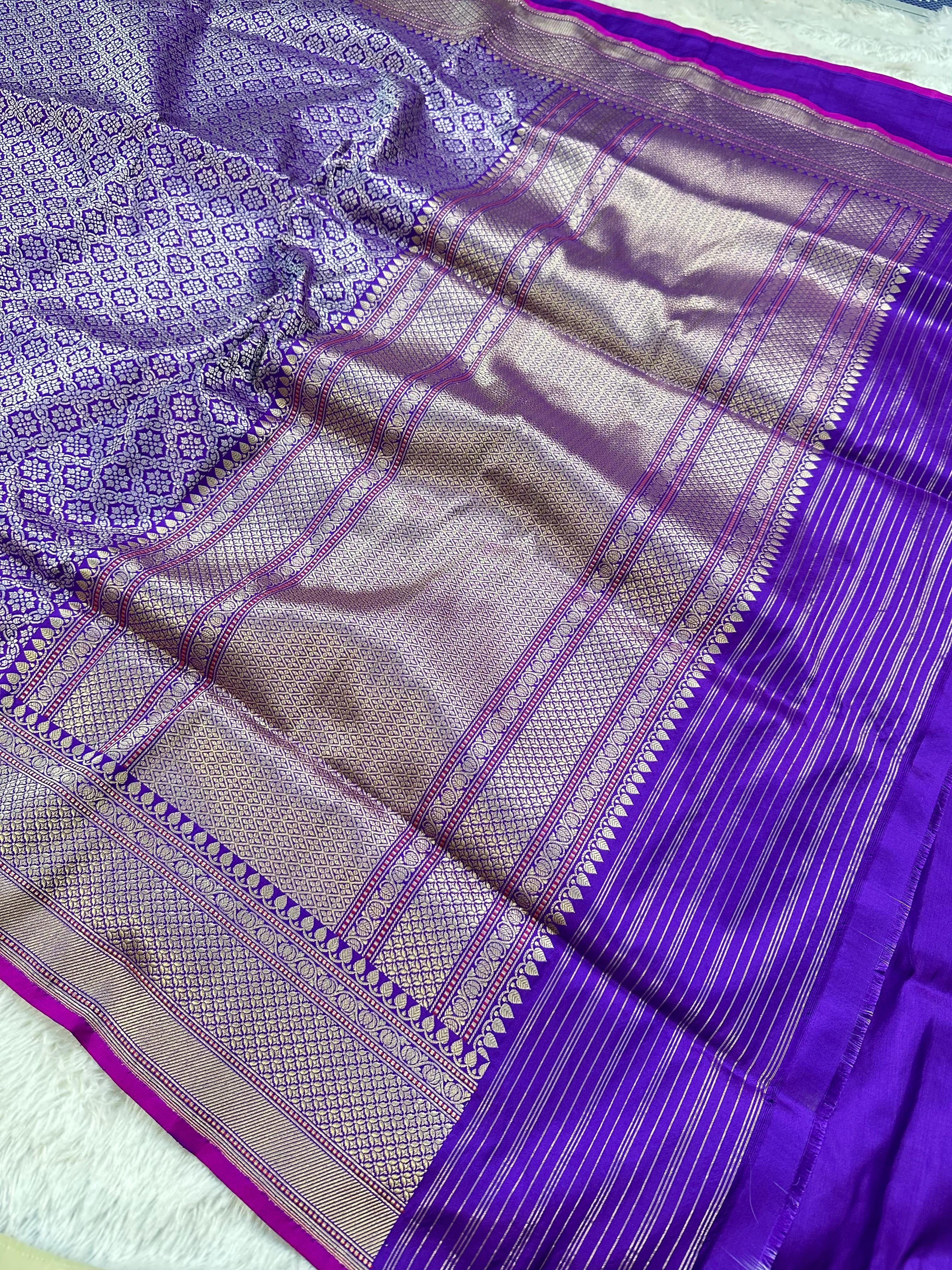 A Beautiful and Delicate Purple saree that appears to be a contemporary take on classic Kadua Banarasi weaving.