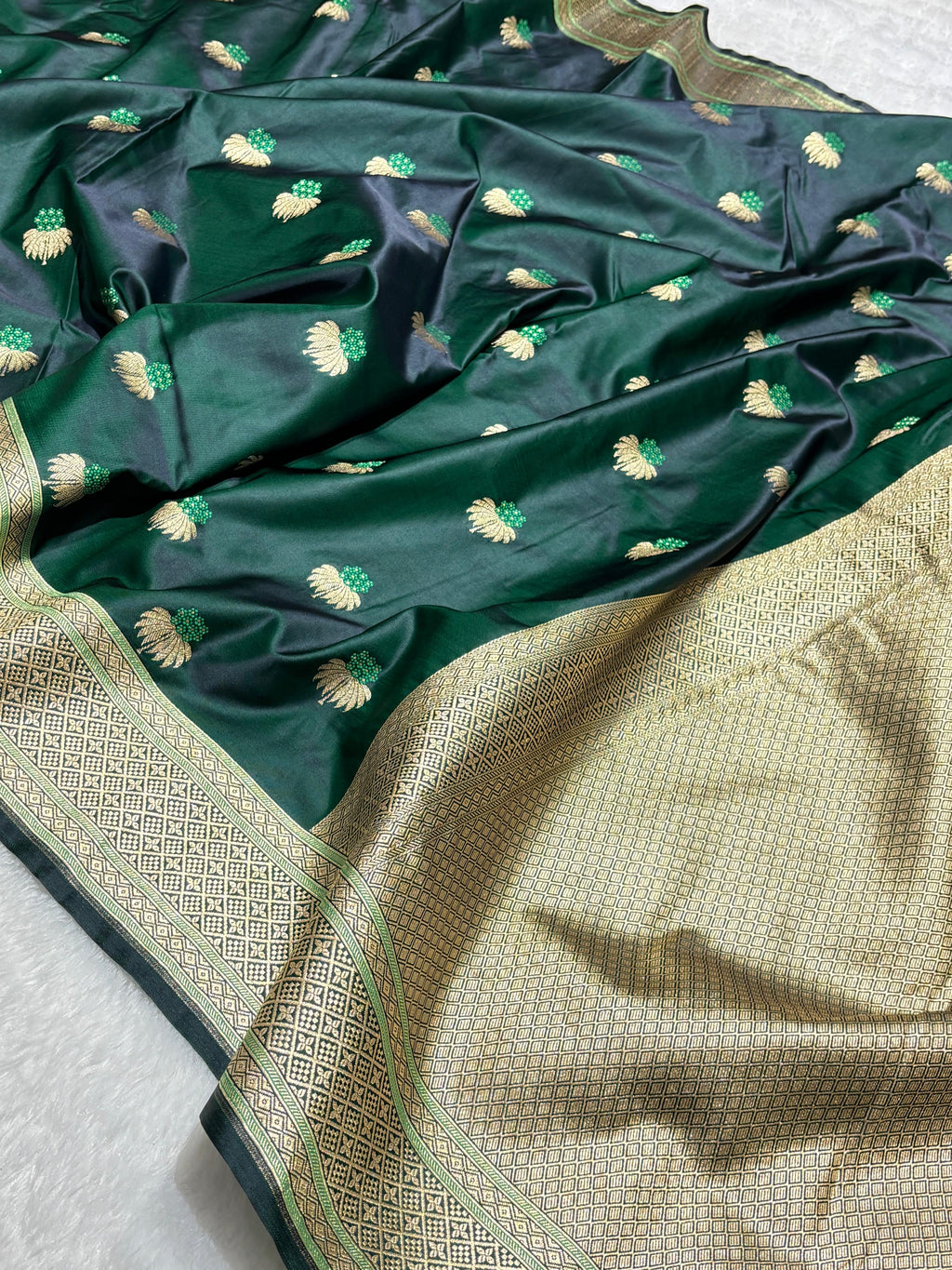 Mesmerising Dark green Mashru Silk Saree with gold zari
