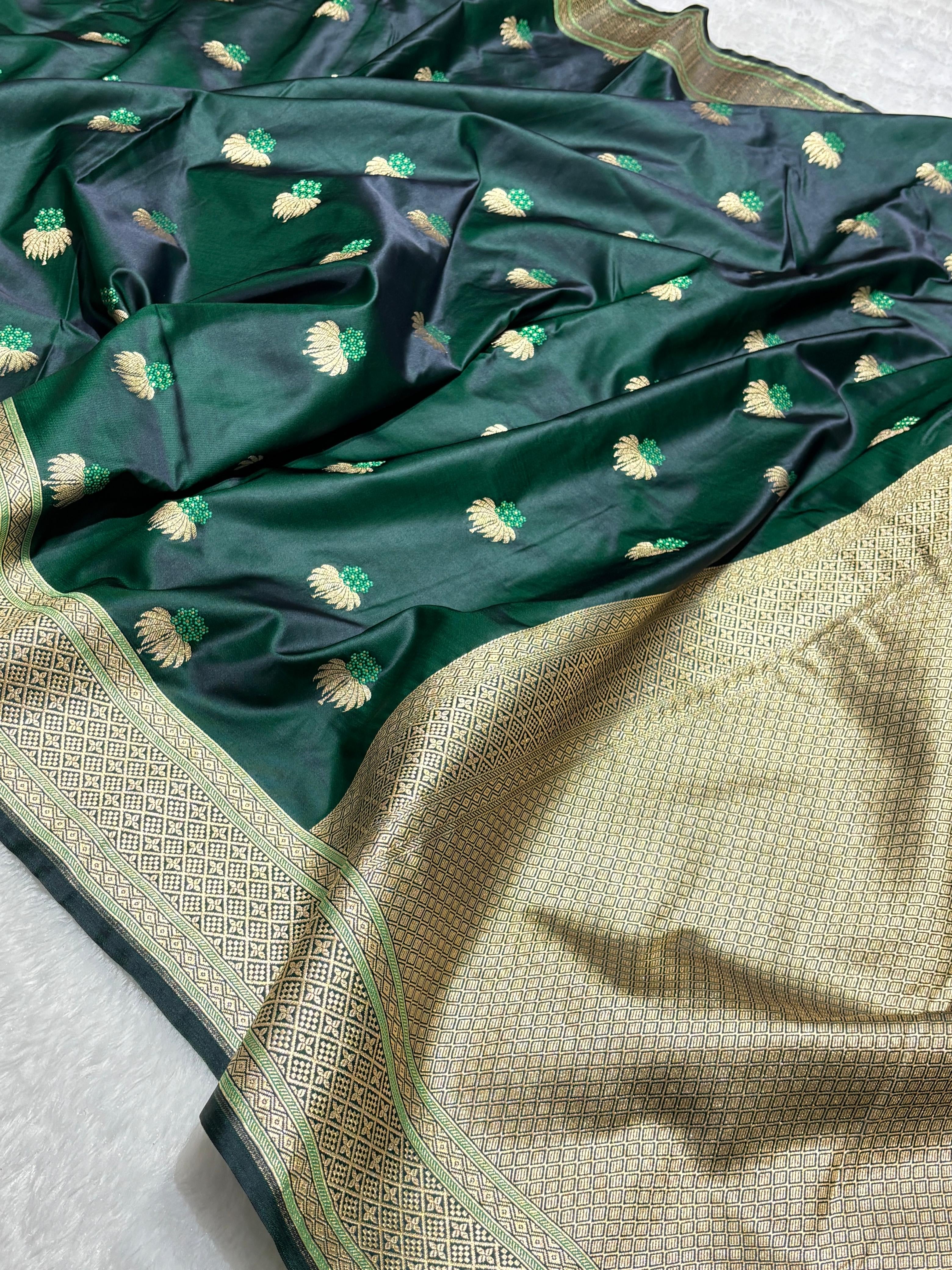 Mesmerising Dark green Mashru Silk Saree with gold zari
