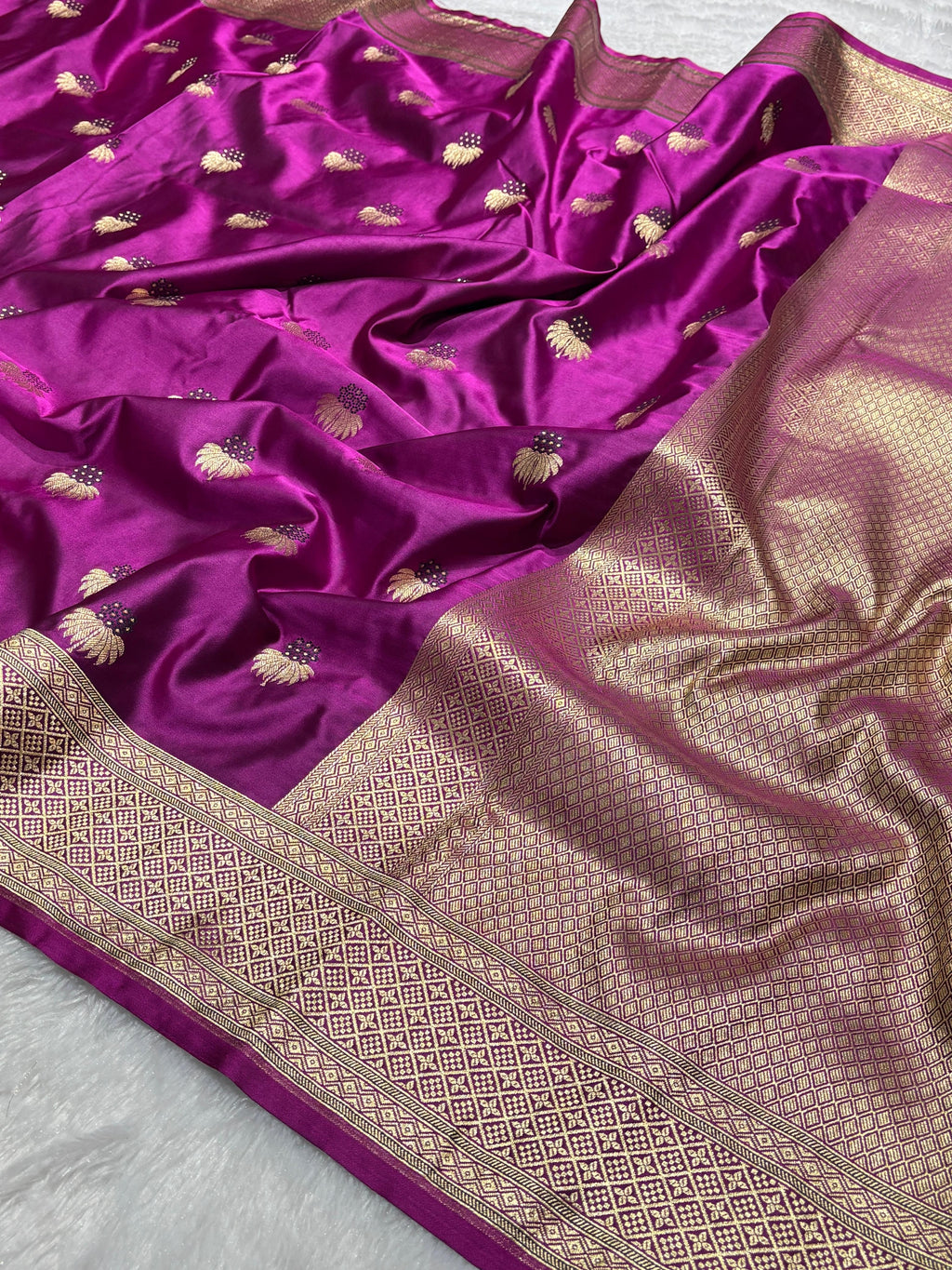 Mesmerising Magenta Color Mashru silk Saree with Gold Border and and Meena Buta in Intricate Patterns