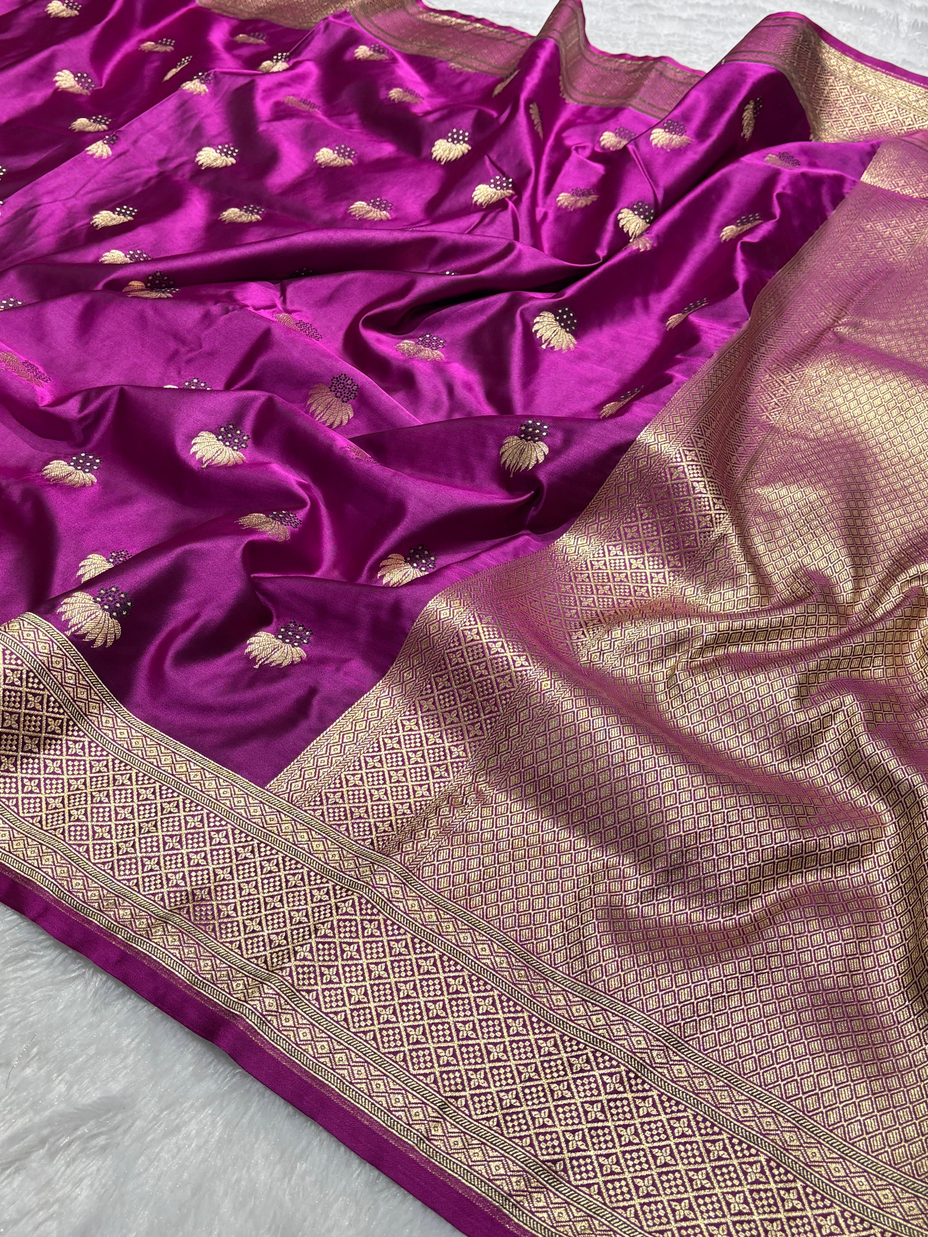 Mesmerising Magenta Color Mashru silk Saree with Gold Border and and Meena Buta in Intricate Patterns