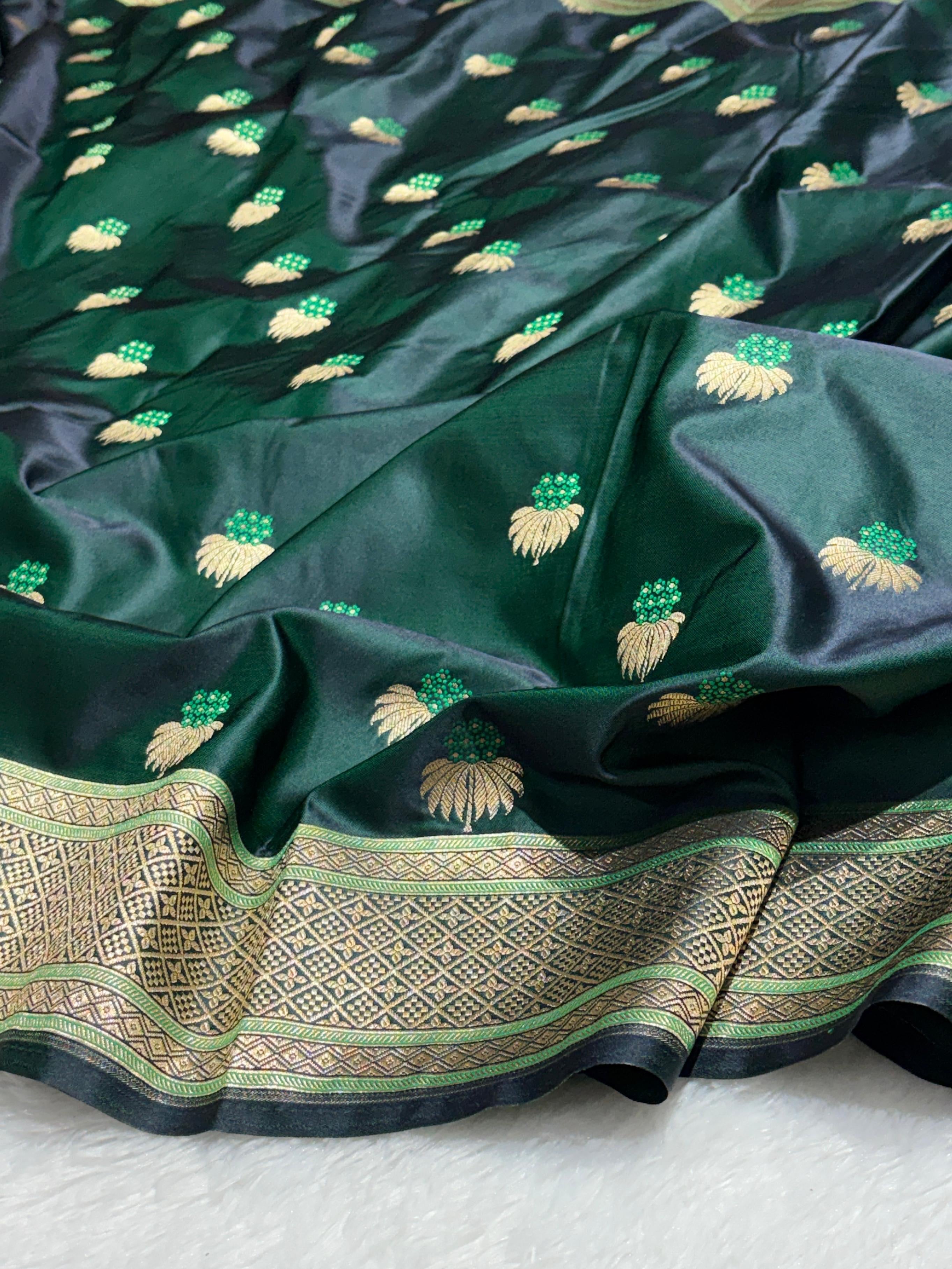 Mesmerising Dark green Mashru Silk Saree with gold zari
