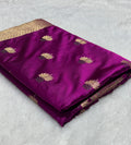 Mesmerising Magenta Color Mashru silk Saree with Gold Border and and Meena Buta in Intricate Patterns