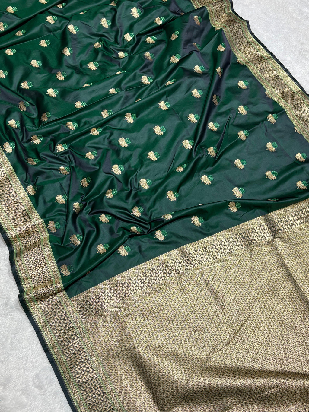 Mesmerising Dark green Mashru Silk Saree with gold zari