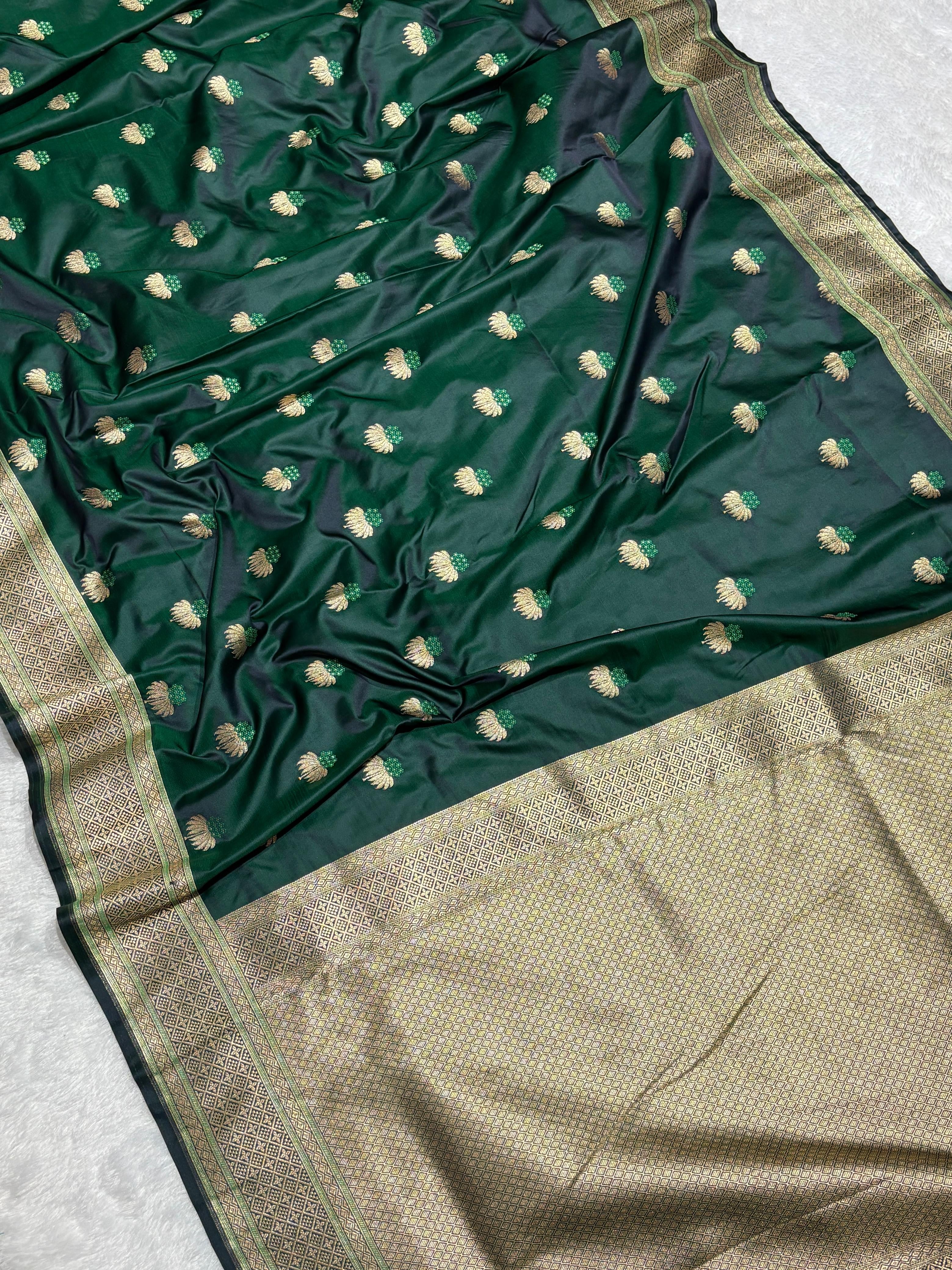 Mesmerising Dark green Mashru Silk Saree with gold zari