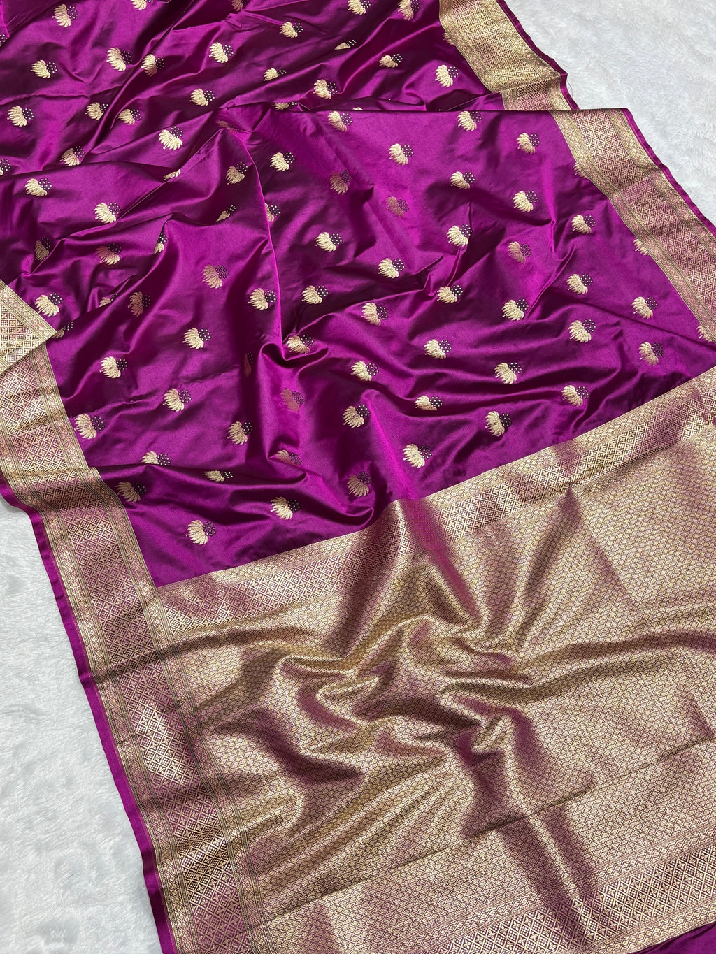 Mesmerising Magenta Color Mashru silk Saree with Gold Border and and Meena Buta in Intricate Patterns