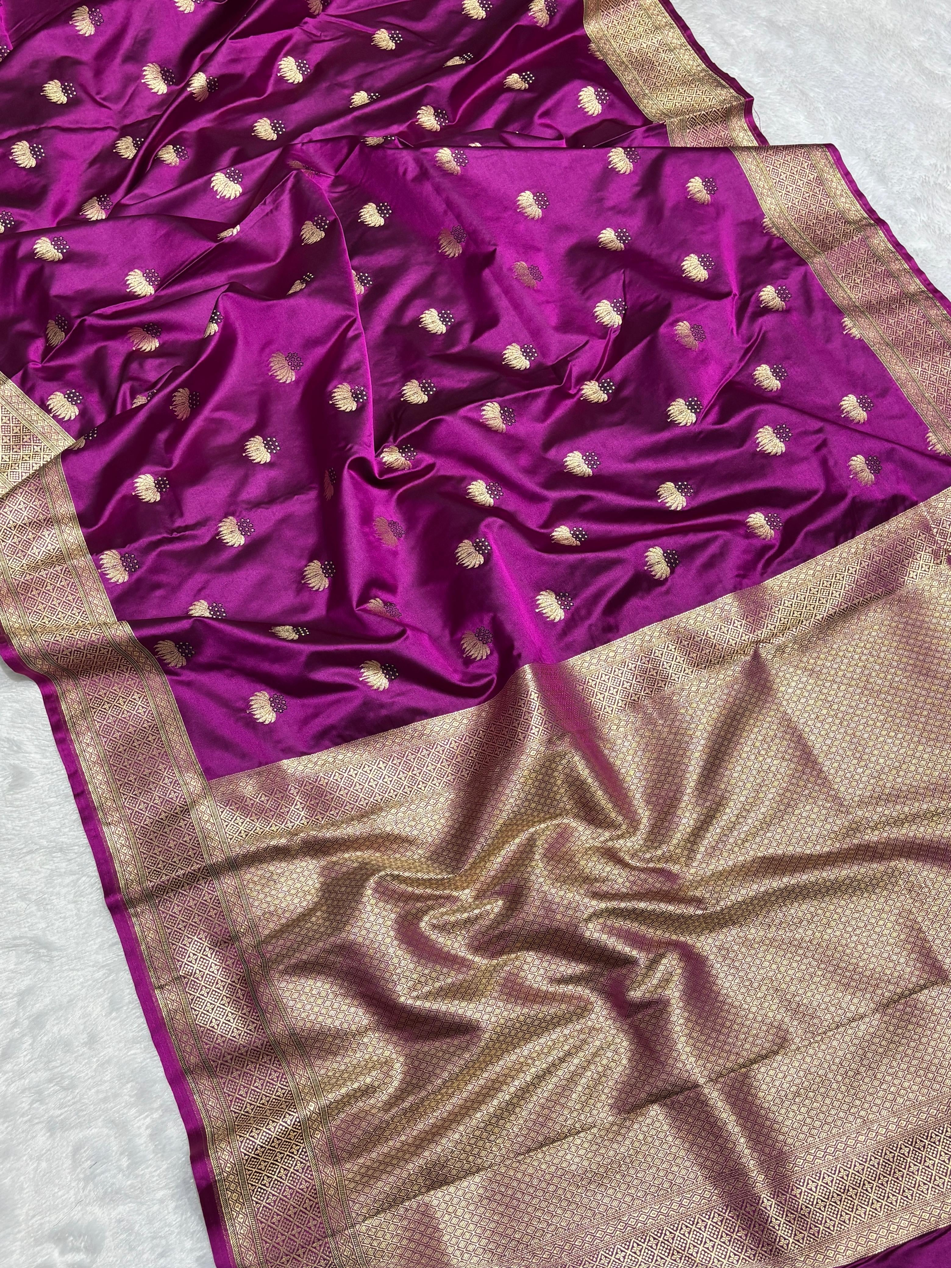 Mesmerising Magenta Color Mashru silk Saree with Gold Border and and Meena Buta in Intricate Patterns