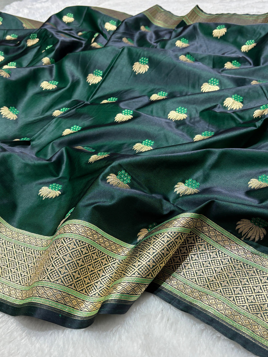 Mesmerising Dark green Mashru Silk Saree with gold zari