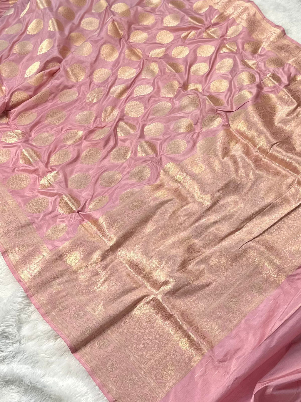Pure katan silk banarasi saree woven with golden zari in buta pattern