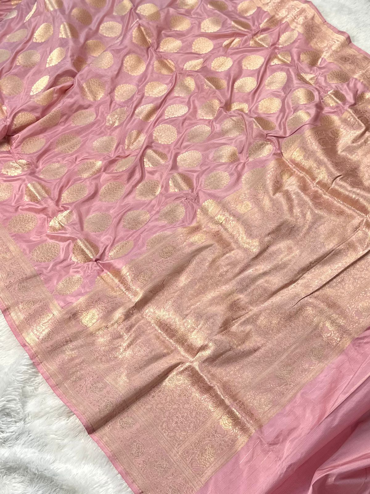 Pure katan silk banarasi saree woven with golden zari in buta pattern