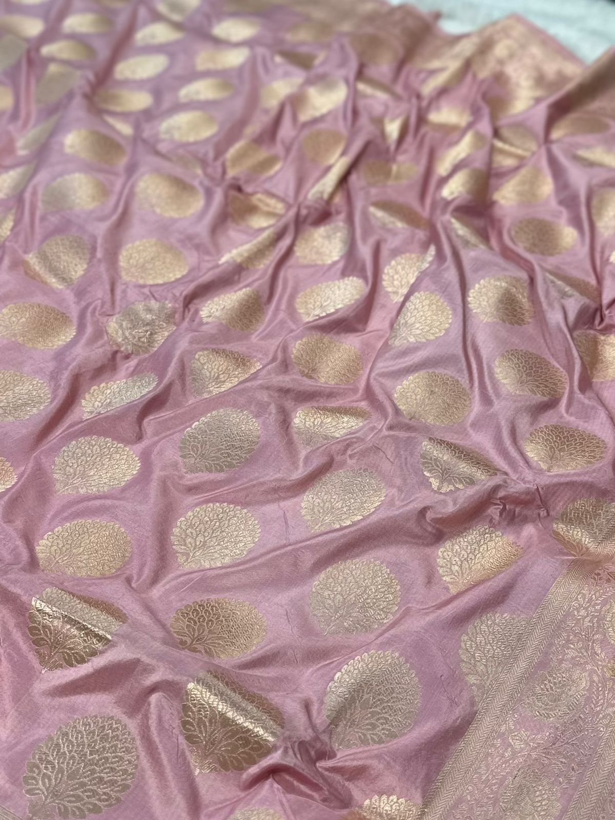 Pure katan silk banarasi saree woven with golden zari in buta pattern